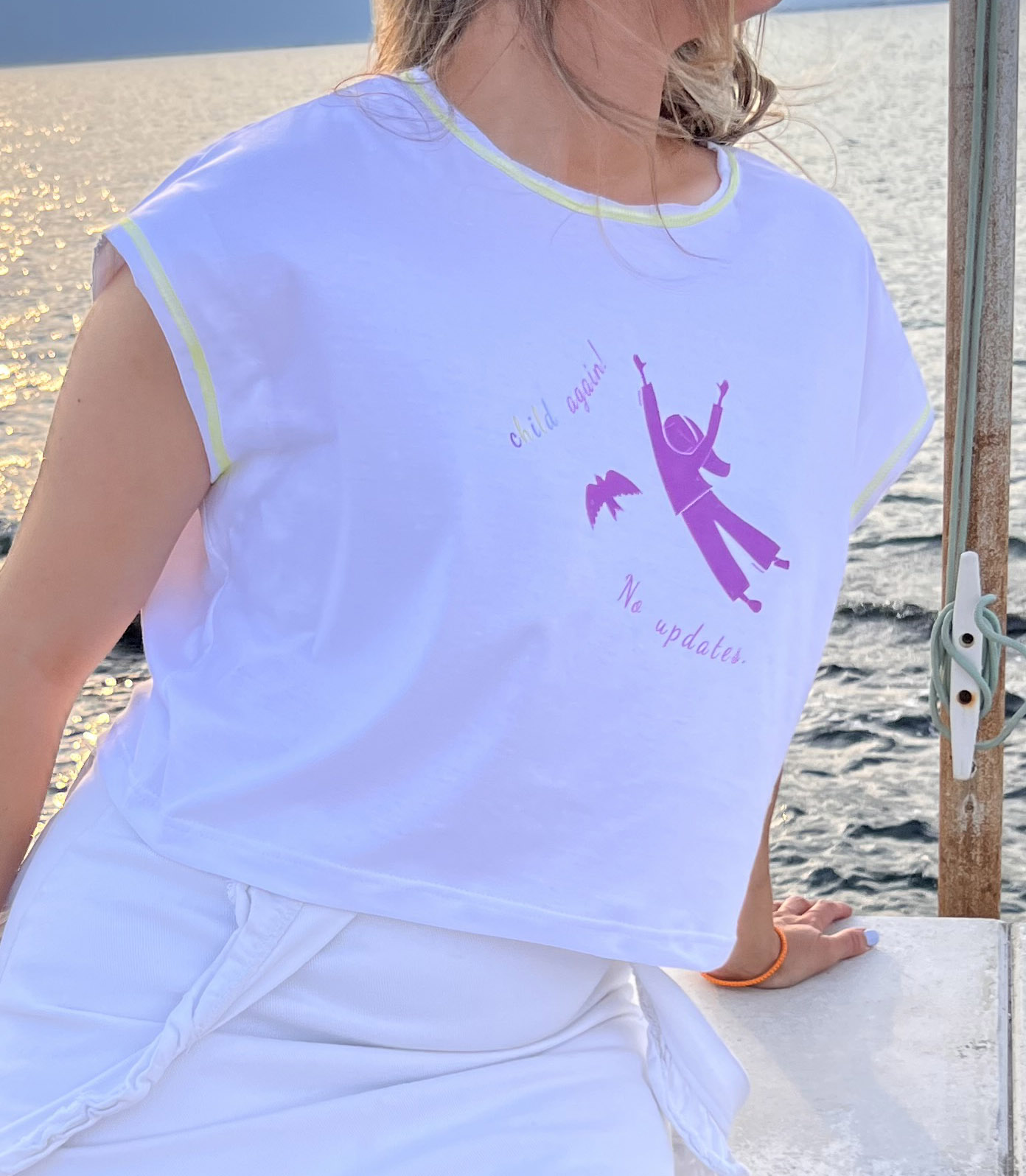white crop top, cotton, illustrated with minimal purple stamp