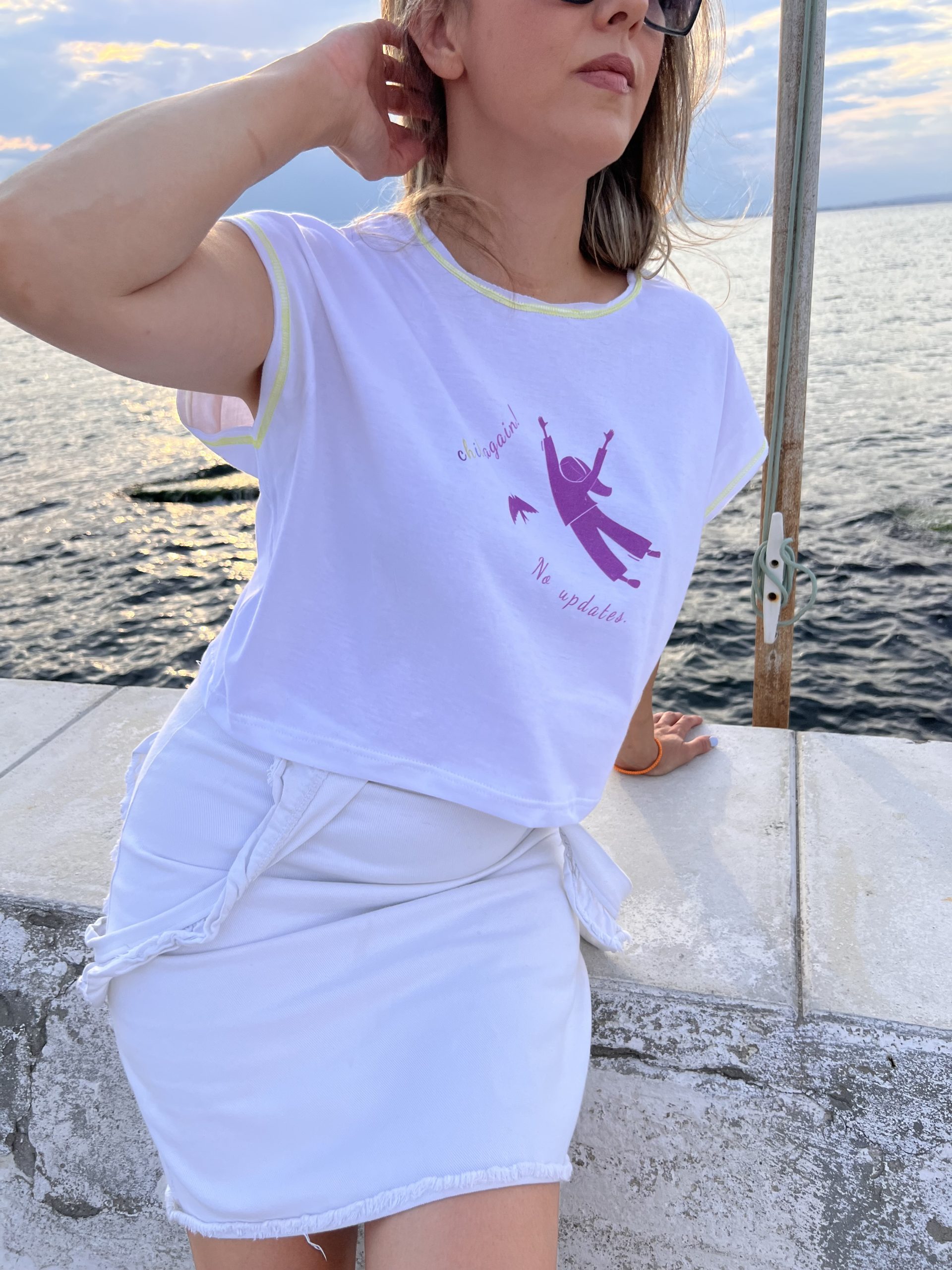 white crop top, cotton, illustrated with minimal purple stamp,
